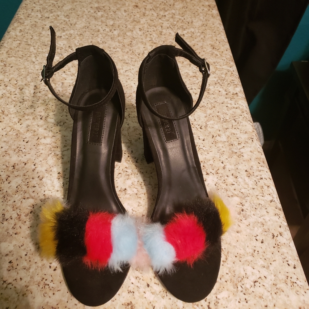 Black wide high heels with multicolored pompoms